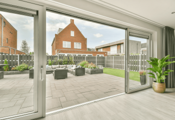 Indoor view of open sliding patio doors